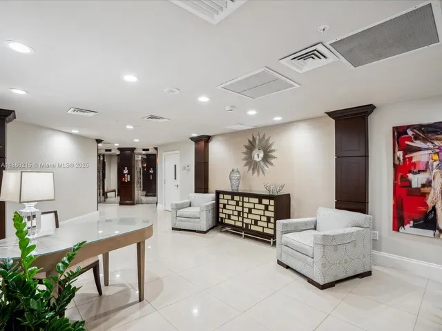 a view of a dining room with furniture and window