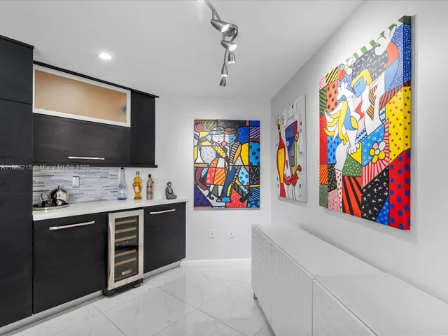 a view of cabinets and wooden floor