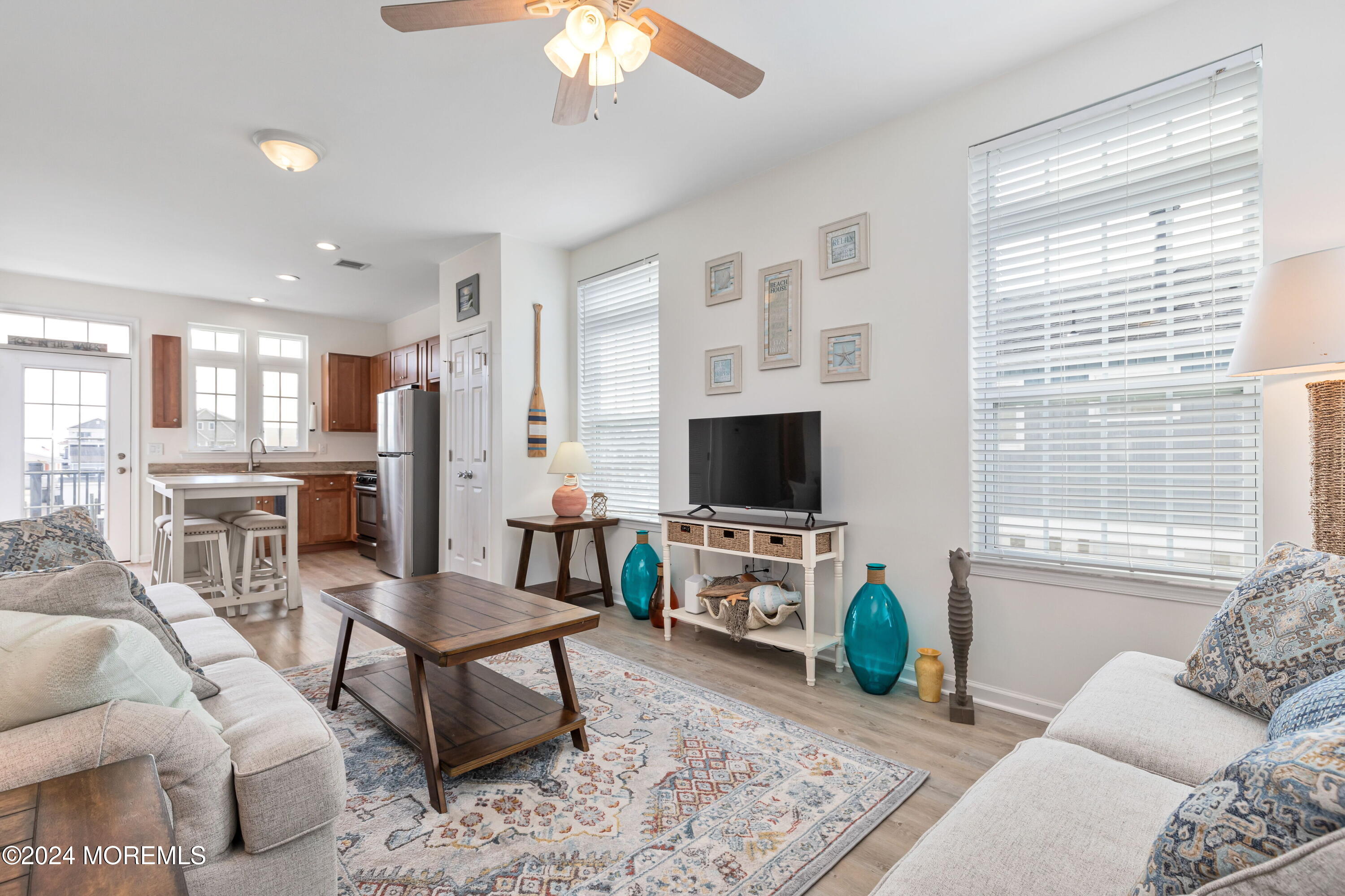 145 Flamingo Road Tuckerton, NJ 08087 - Photo 6 of 43 a living room with furniture and a flat screen tv