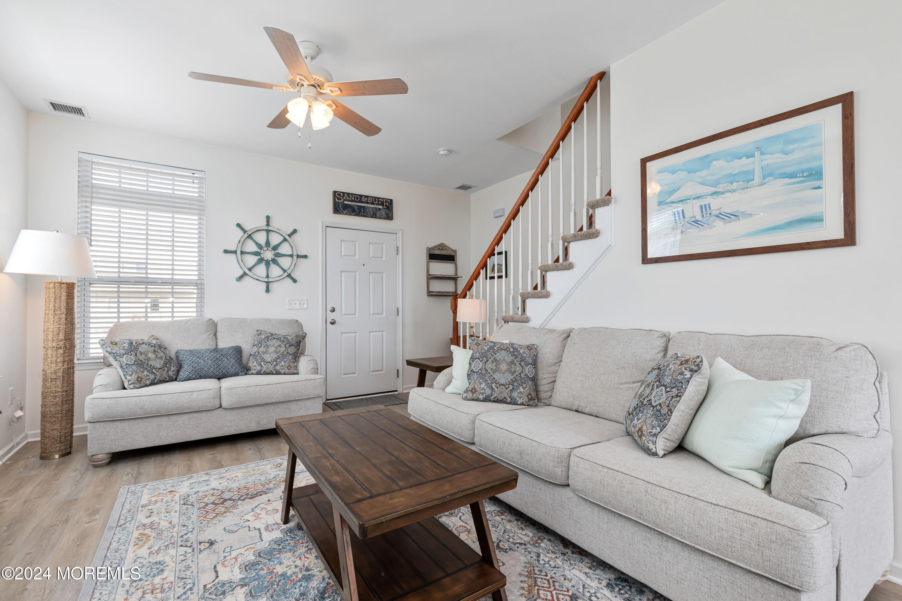 145 Flamingo Road Tuckerton, NJ 08087 - Photo 9 of 43 a living room with furniture and a large window