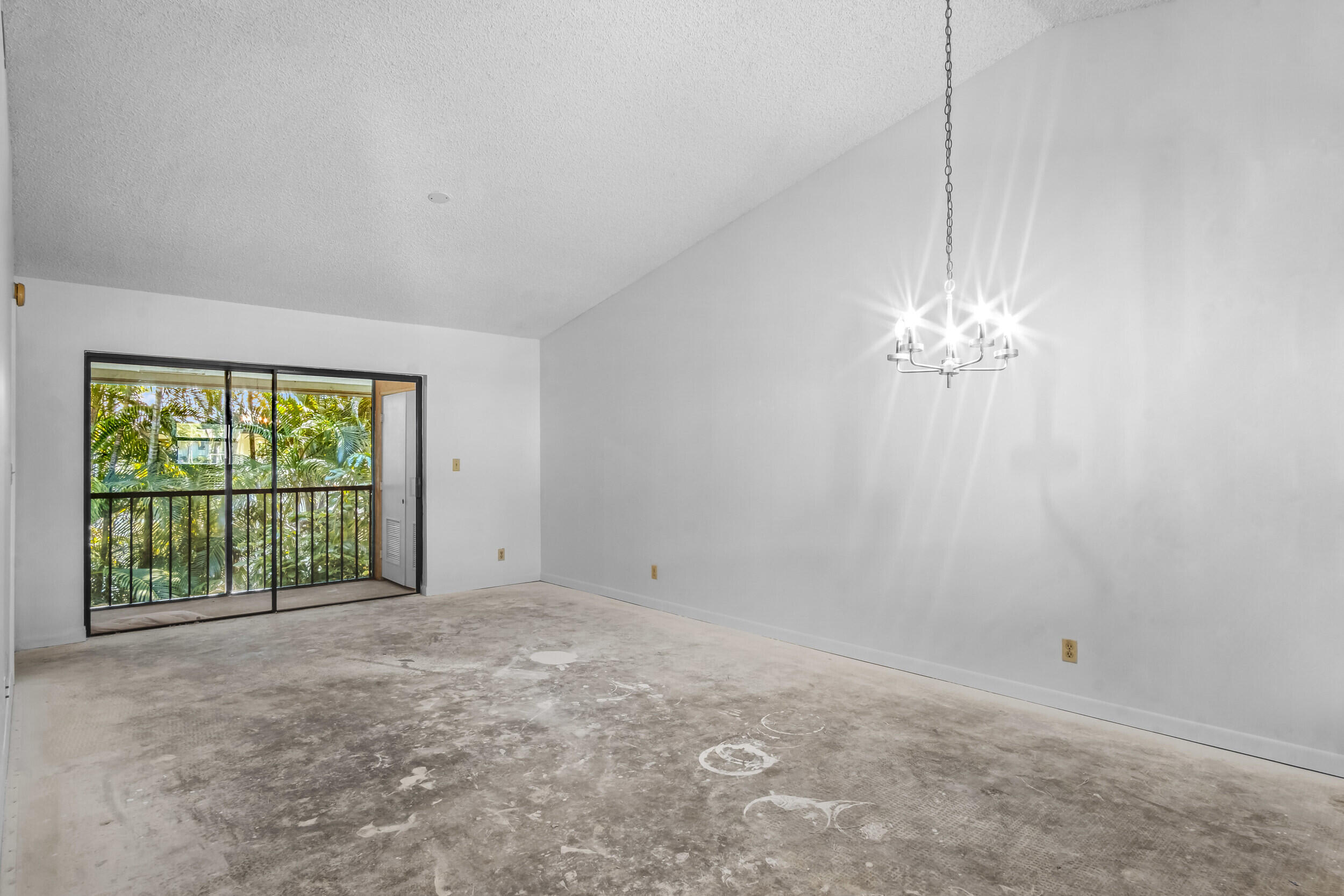 22076 Palms Way, Unit 203 Boca Raton, FL 33433 - Photo 11 of 25 a view of an empty room with a window