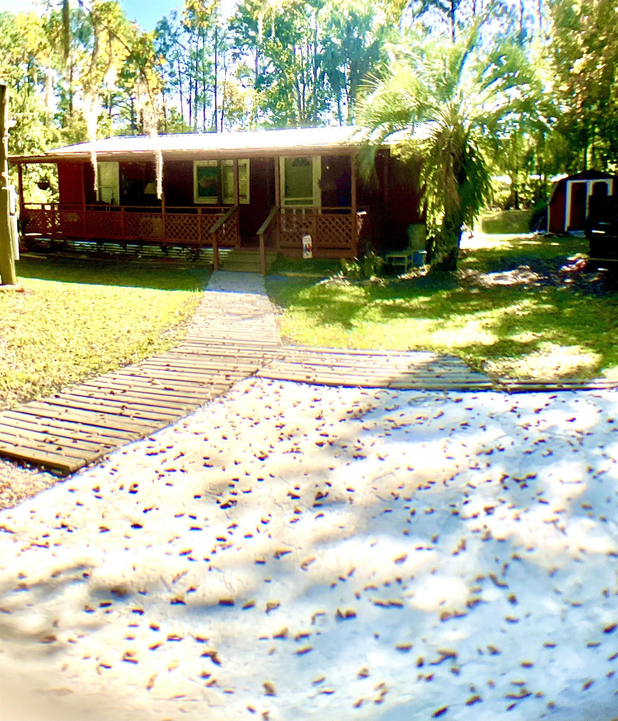 1611 Brian Way St. Augustine, FL 32084 - Photo 8 of 23 a view of a house with a yard