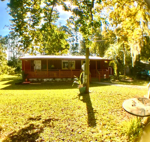 a view of a swimming pool with an outdoor seating