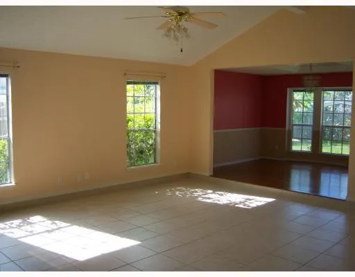 a view of an empty room and window