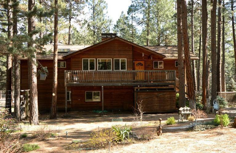 69762 Camp Polk Road Sisters, OR 97759 - Photo 1 of 24 Front entrance with under deck storage