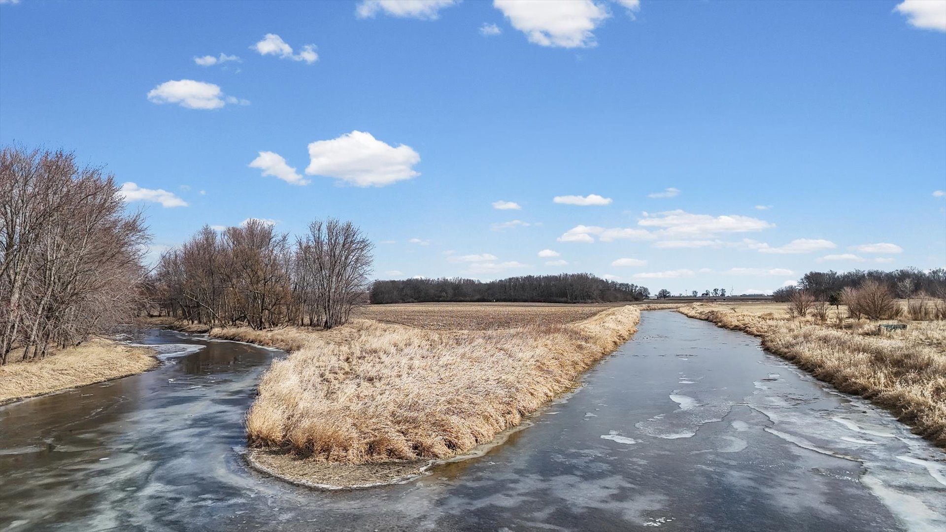 N 2545 E Road Farmer City, IL 61842 - Photo 24 of 47 a view of a lake in middle of the house