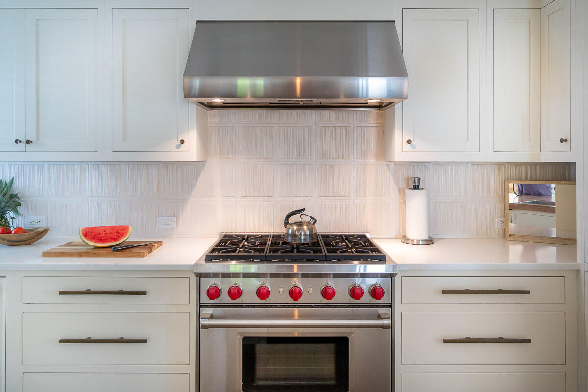 42.5 Union Street Nantucket, MA 02554 - Photo 12 of 33 a stove top oven sitting inside of a kitchen