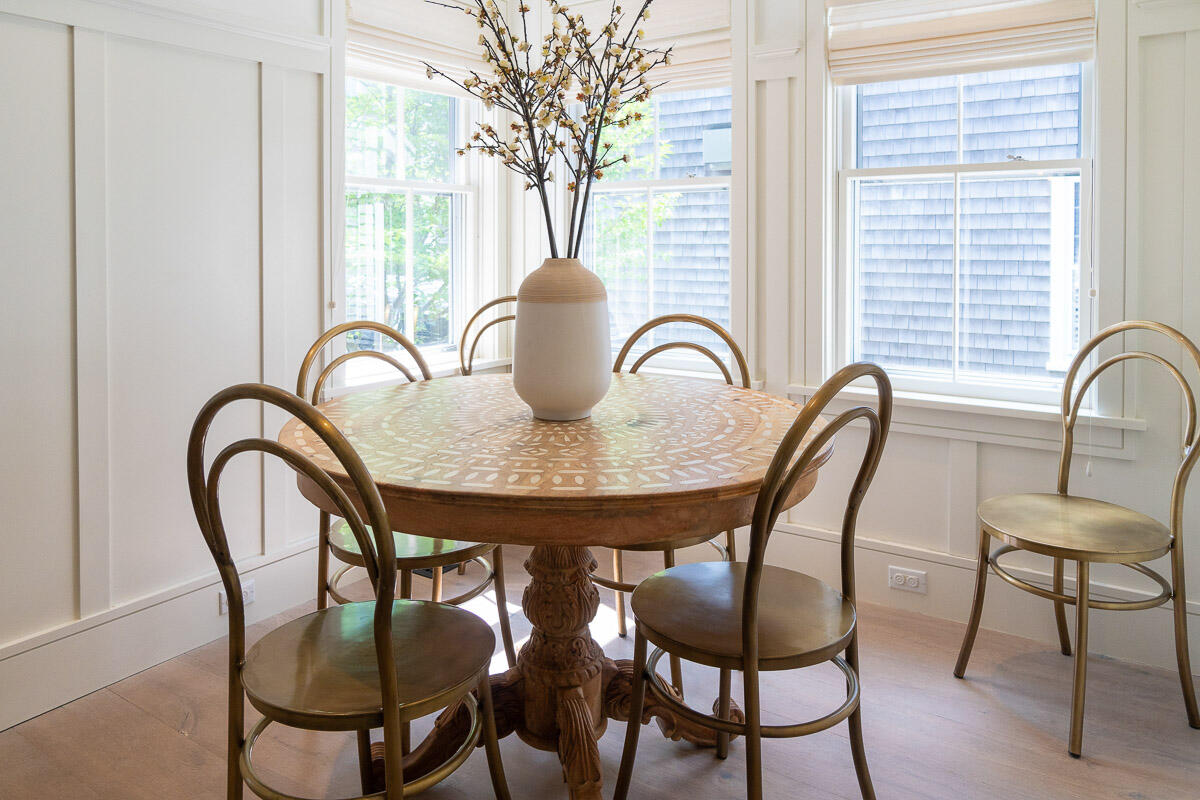 42.5 Union Street Nantucket, MA 02554 - Photo 14 of 33 a dining room with furniture and window