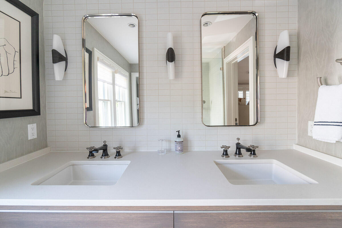 42.5 Union Street Nantucket, MA 02554 - Photo 19 of 33 a bathroom with sink mirror and vanity