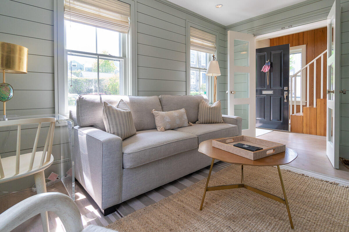 42.5 Union Street Nantucket, MA 02554 - Photo 2 of 33 a living room with furniture and a window