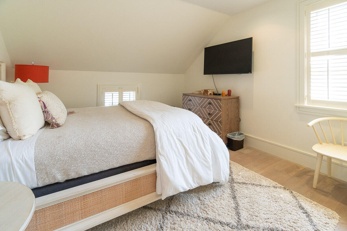 42.5 Union Street Nantucket, MA 02554 - Photo 24 of 33 a bedroom with a bed and a flat screen tv
