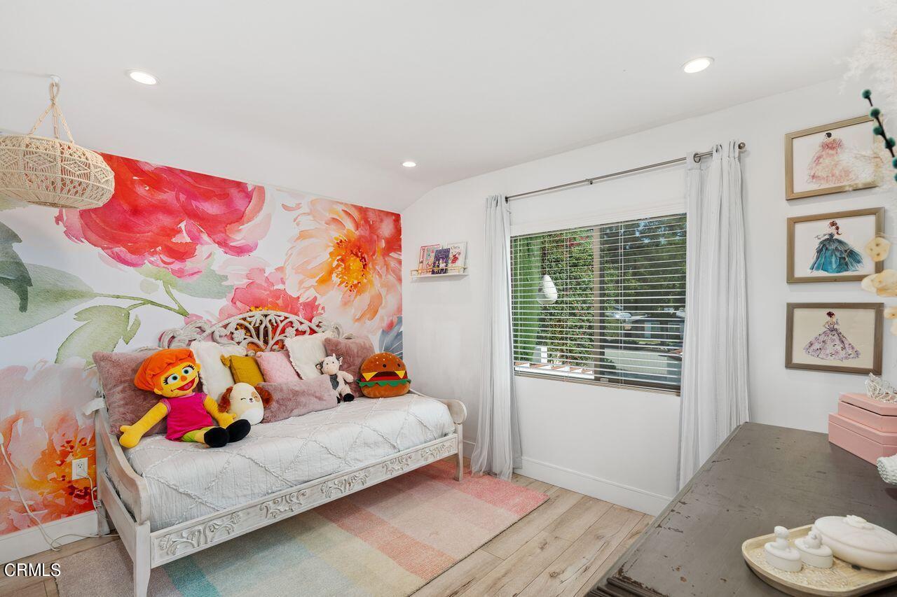 3875 Cartwright Street Pasadena, CA 91107 - Photo 16 of 25 a bedroom with a bed and window