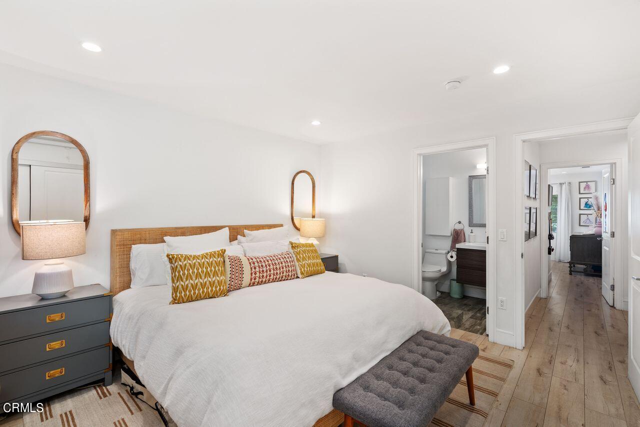 3875 Cartwright Street Pasadena, CA 91107 - Photo 19 of 25 a bedroom with a bed and a dresser