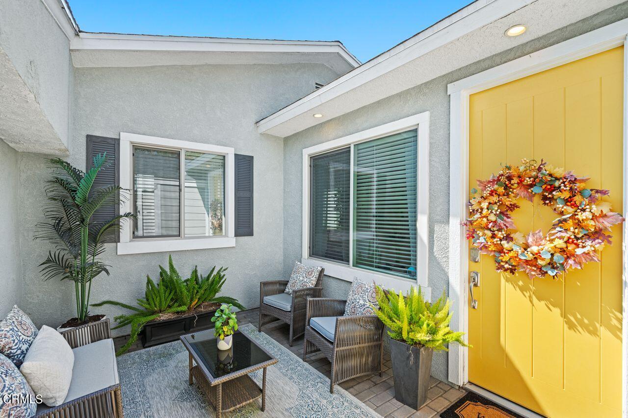 3875 Cartwright Street Pasadena, CA 91107 - Photo 2 of 25 a potted plant sitting in front of a house
