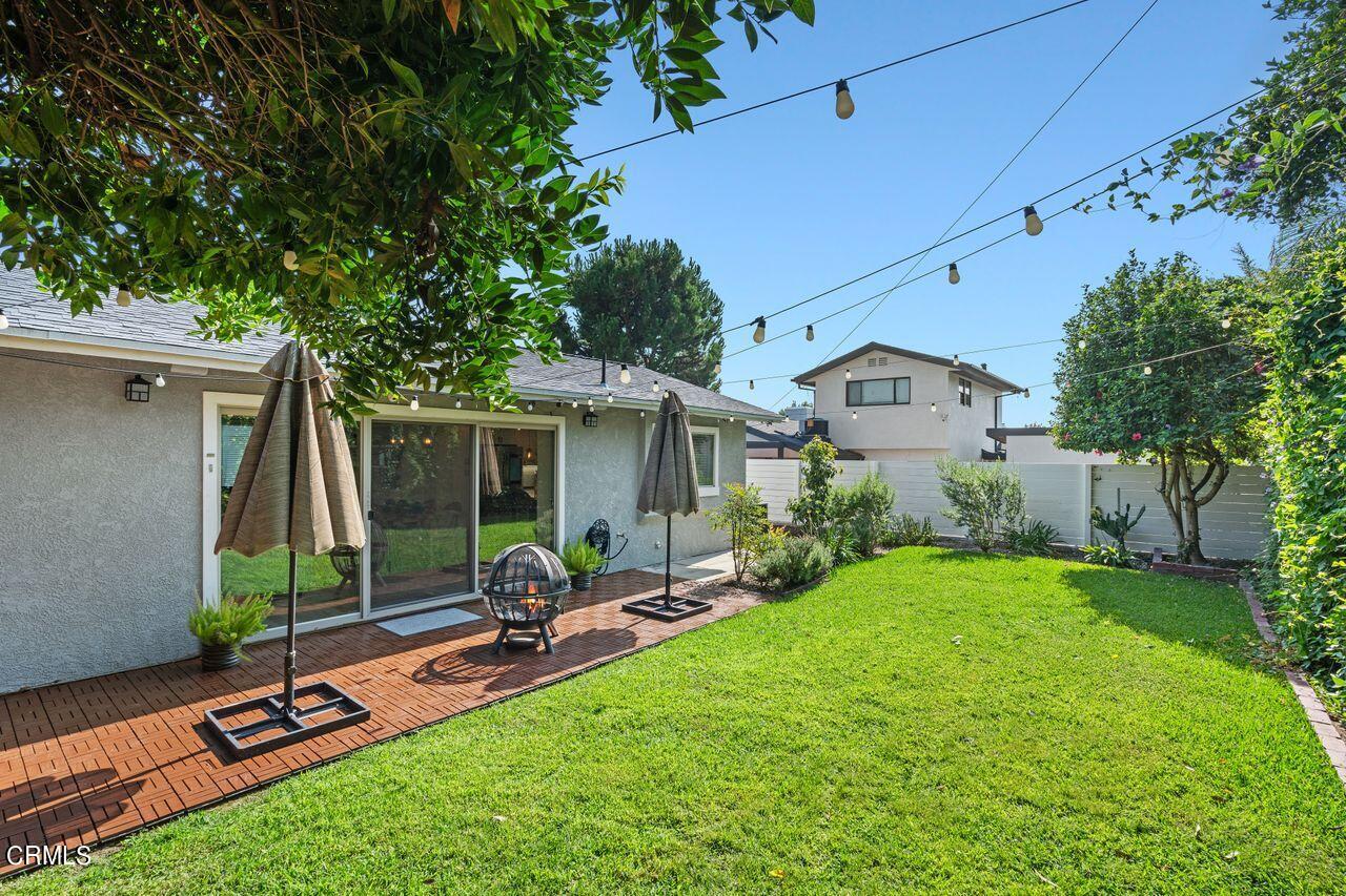 3875 Cartwright Street Pasadena, CA 91107 - Photo 22 of 25 a view of a backyard with a patio
