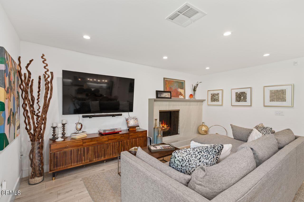 3875 Cartwright Street Pasadena, CA 91107 - Photo 5 of 25 a living room with furniture and a flat screen tv