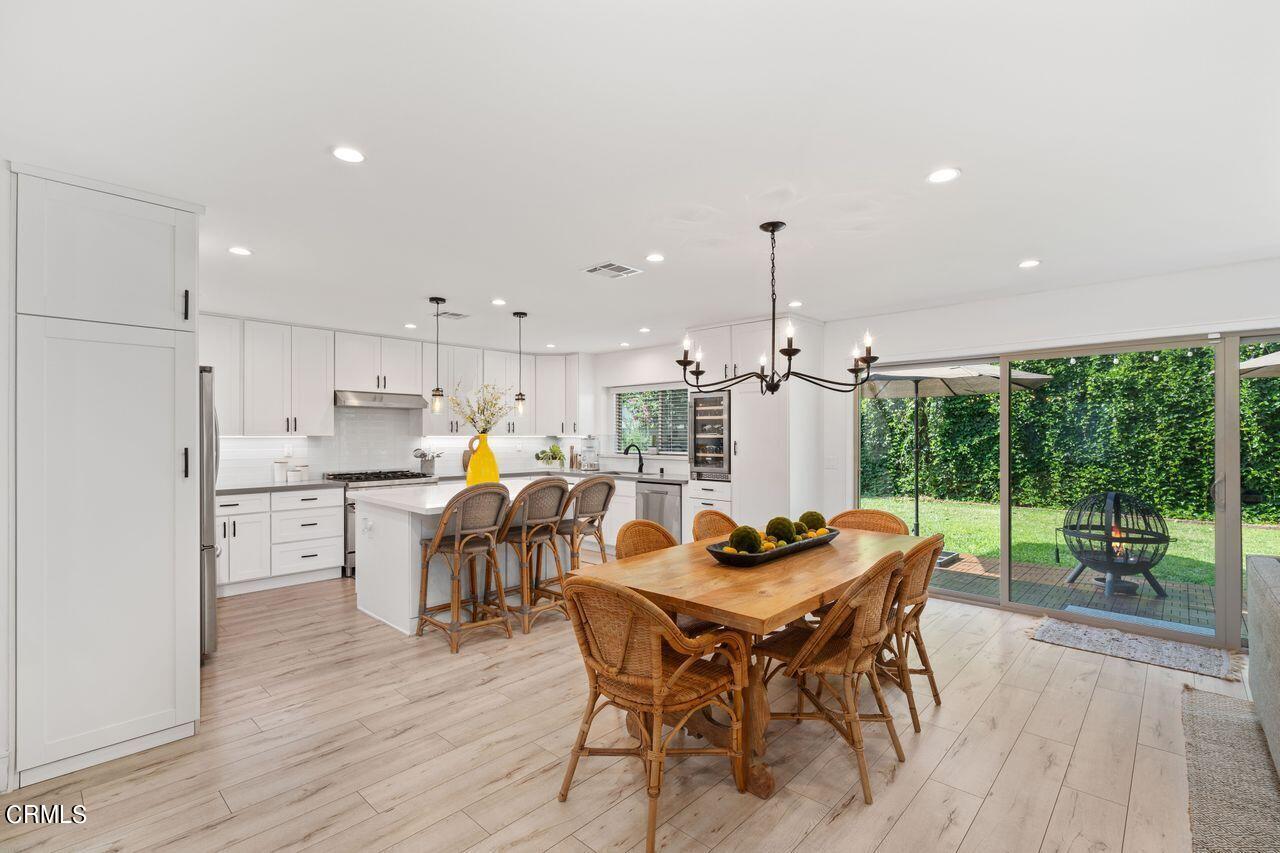 3875 Cartwright Street Pasadena, CA 91107 - Photo 7 of 25 a dining room with furniture and a floor to ceiling window
