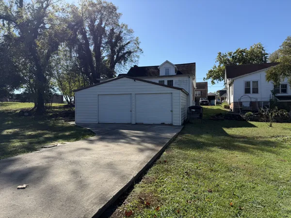 a house view with a backyard space