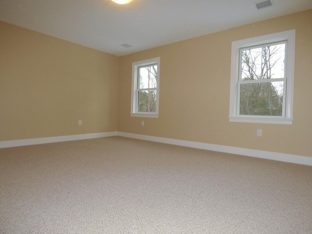 16 Kevin's Way, Unit 7 Scituate, MA 02066 - Photo 9 of 19 an empty room with a window