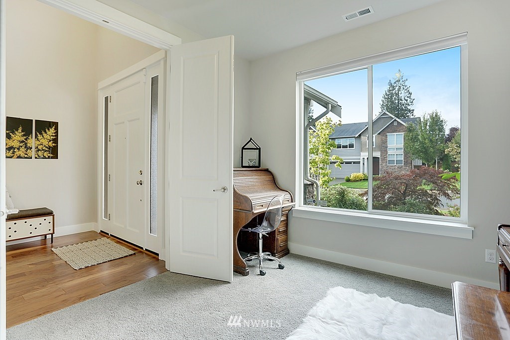 5213 Northeast 2nd Place Renton, WA 98059 - Photo 14 of 25 a living room with furniture and a window