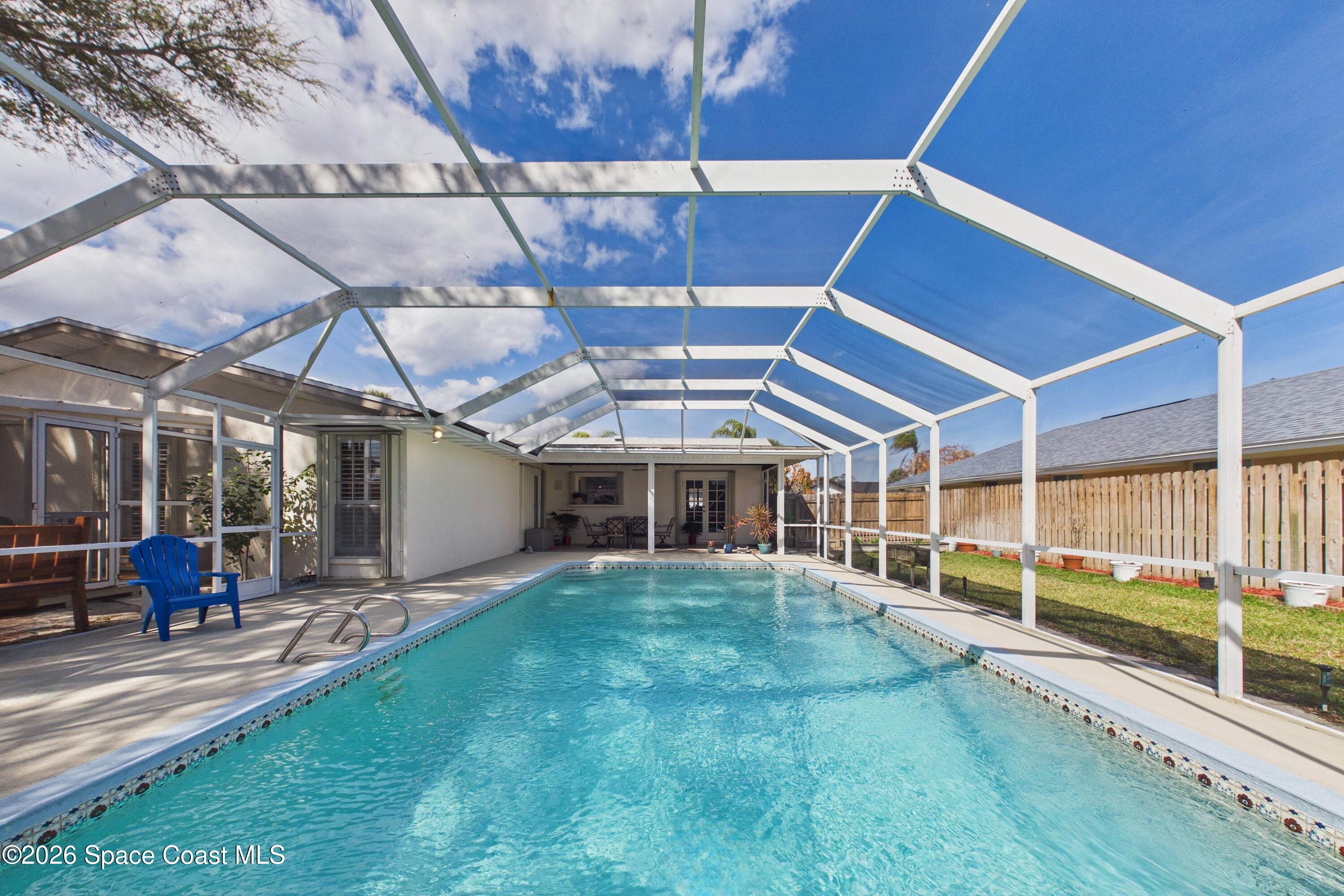 215 Sand Pine Road Indialantic, FL 32903 - Photo 2 of 74 CAM02690G0-PR0233-STILL065_Original