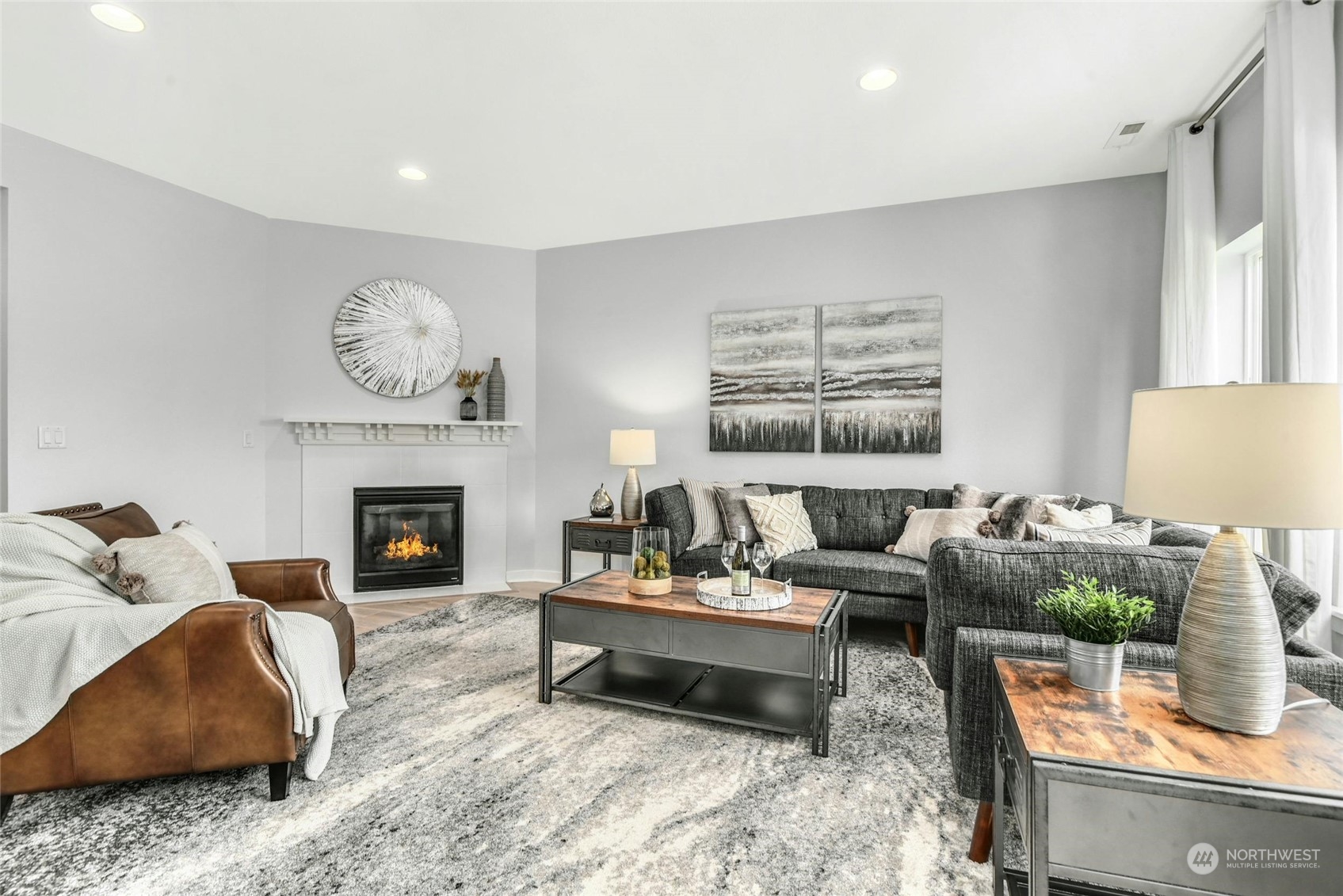 22313 35th Drive Southeast Bothell, WA 98021 - Photo 11 of 26 a living room with furniture and a fireplace