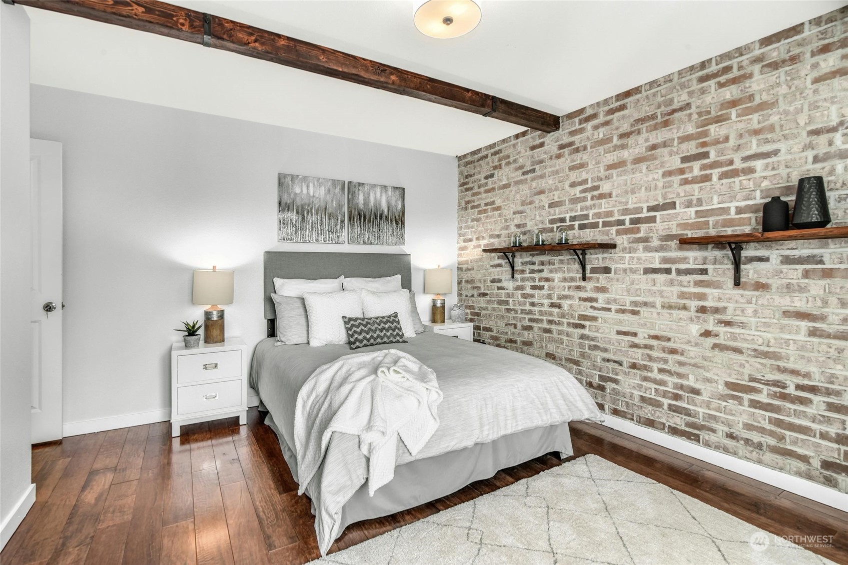 22313 35th Drive Southeast Bothell, WA 98021 - Photo 15 of 26 a bedroom with a bed and a flat screen tv