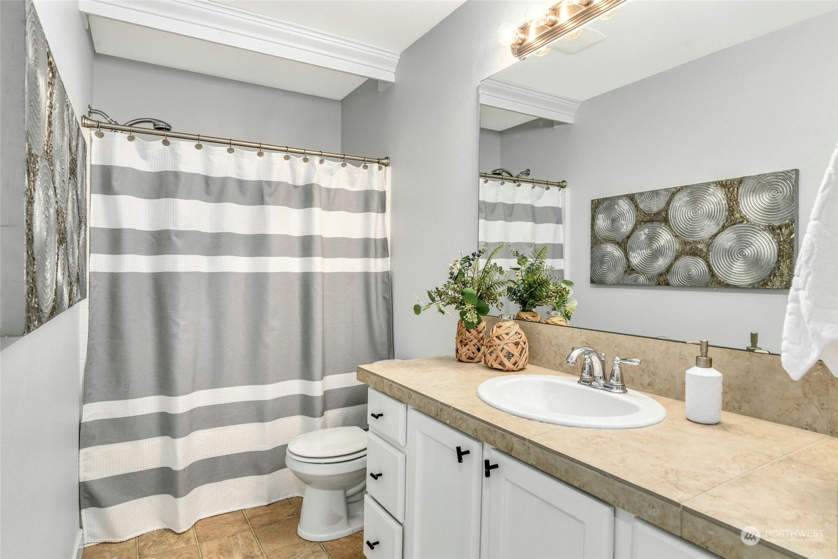 22313 35th Drive Southeast Bothell, WA 98021 - Photo 16 of 26 a bathroom with a granite countertop sink and a mirror