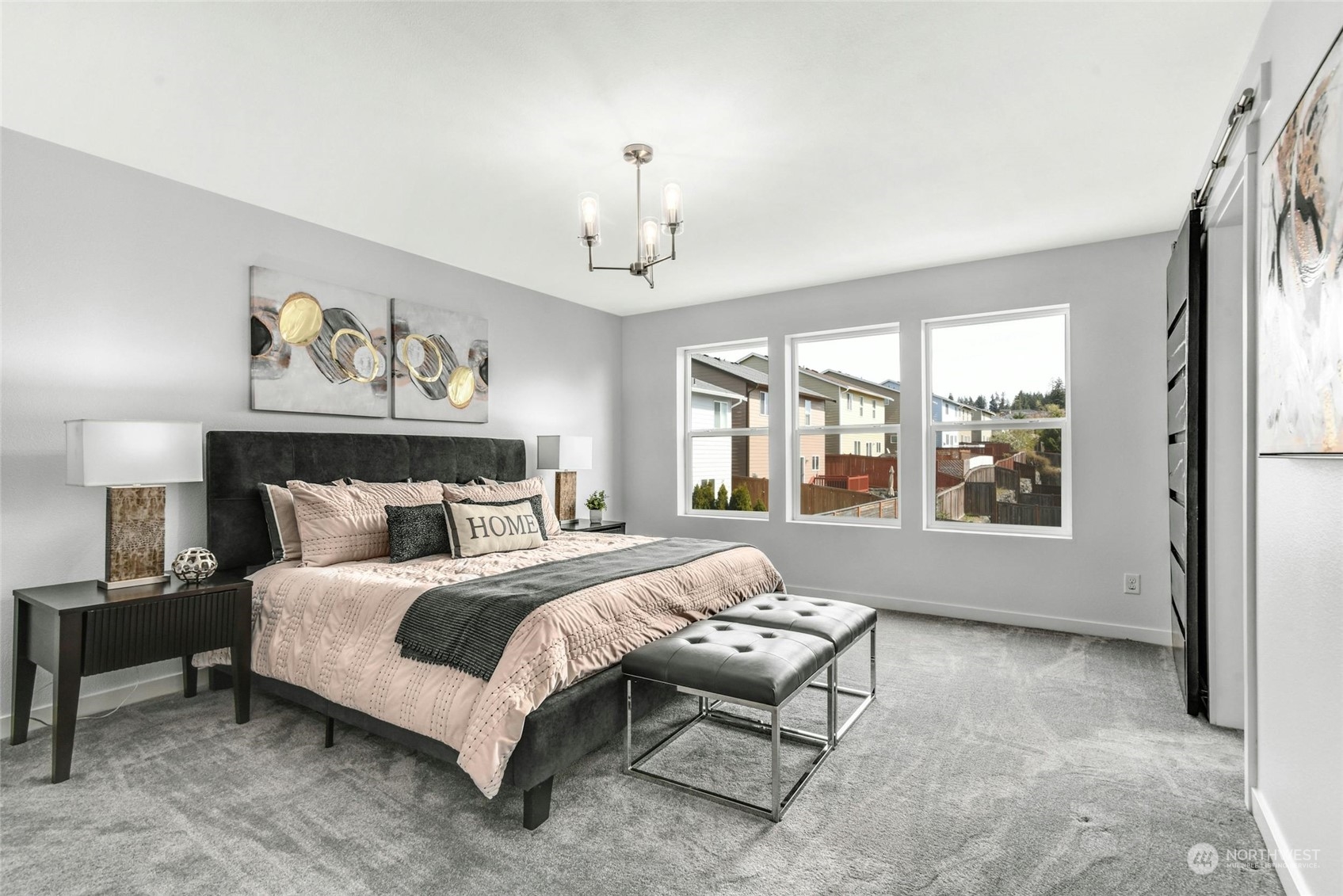 22313 35th Drive Southeast Bothell, WA 98021 - Photo 17 of 26 a bed room with a bed and a painting on the wall