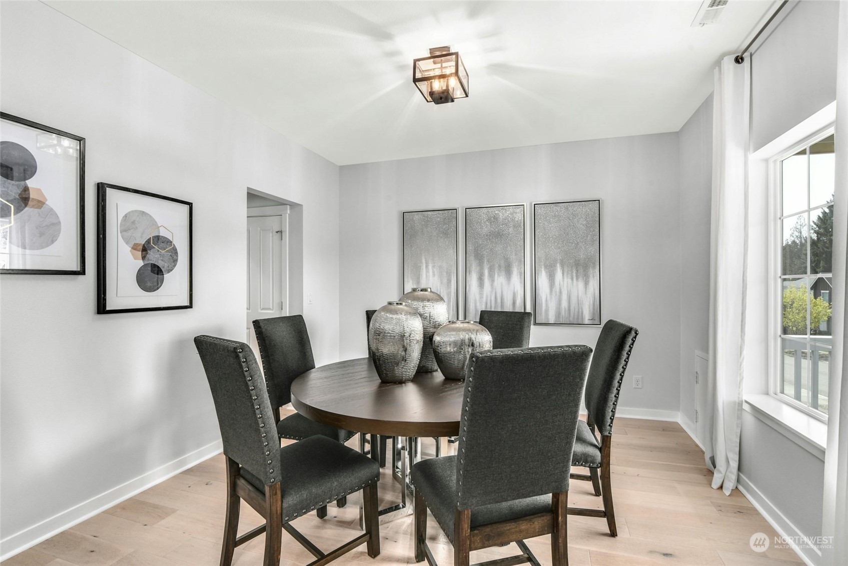 22313 35th Drive Southeast Bothell, WA 98021 - Photo 4 of 26 a view of a dining room with furniture and windows
