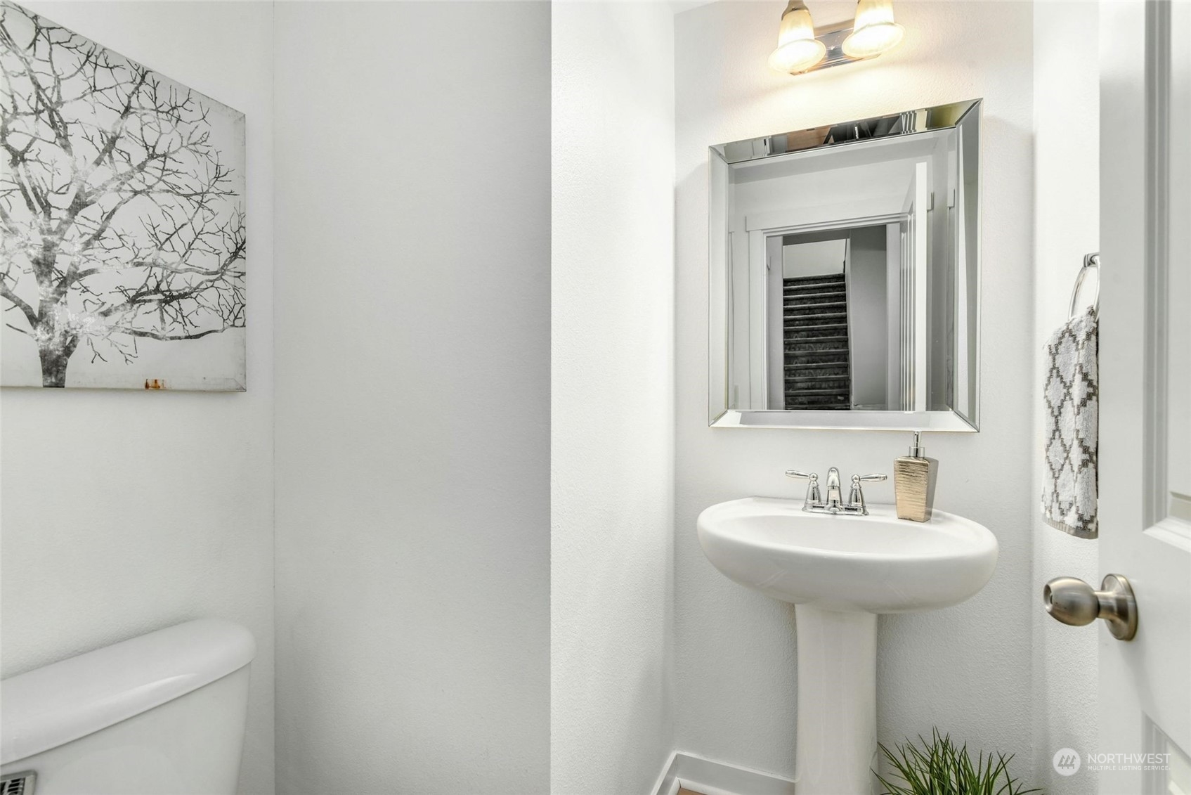 22313 35th Drive Southeast Bothell, WA 98021 - Photo 5 of 26 a bathroom with a sink toilet and mirror
