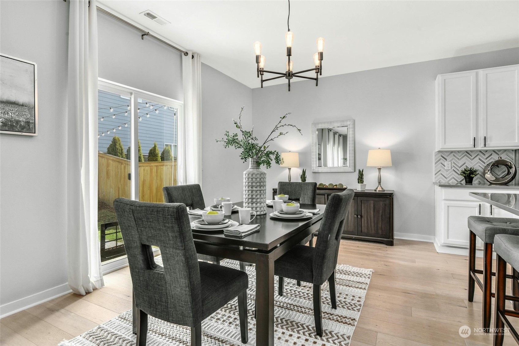 22313 35th Drive Southeast Bothell, WA 98021 - Photo 9 of 26 a dining room with furniture a chandelier and window