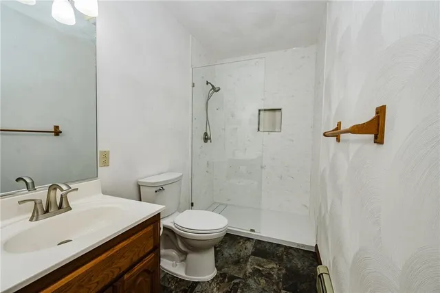 a bathroom with a sink and a toilet