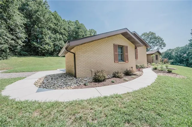 a view of a backyard of the house