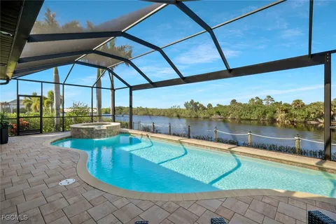 a view of a swimming pool with a porch