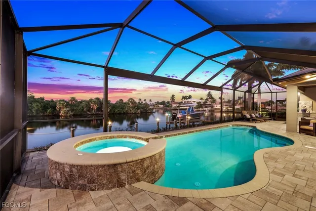 a view of a swimming pool with a porch