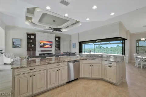 a kitchen with lots of counter space and a sink