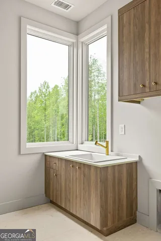 a view of a kitchen with a window