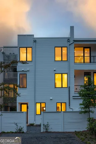 a view of a brick house with windows