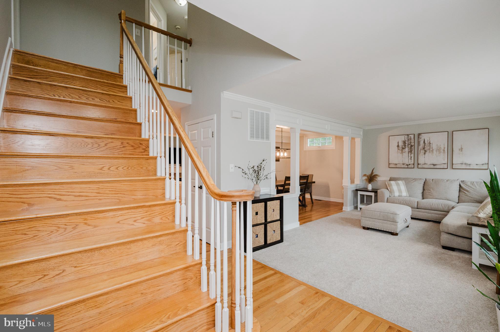 9003 Gardenia Road Baltimore, MD 21236 - Photo 4 of 68 Foyer Area with Hardwood Flooring and Staircase