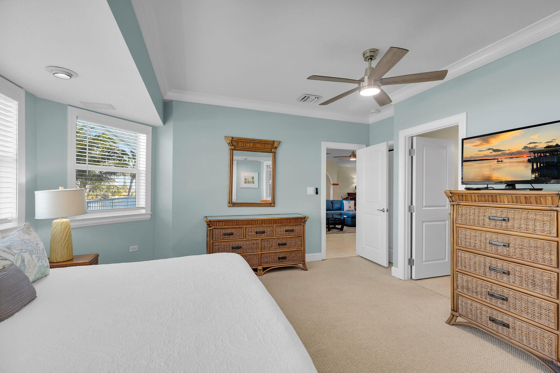 580-590 10th Street Key Colony Beach, FL 33051 - Photo 31 of 75 a bedroom with a bed and a dresser
