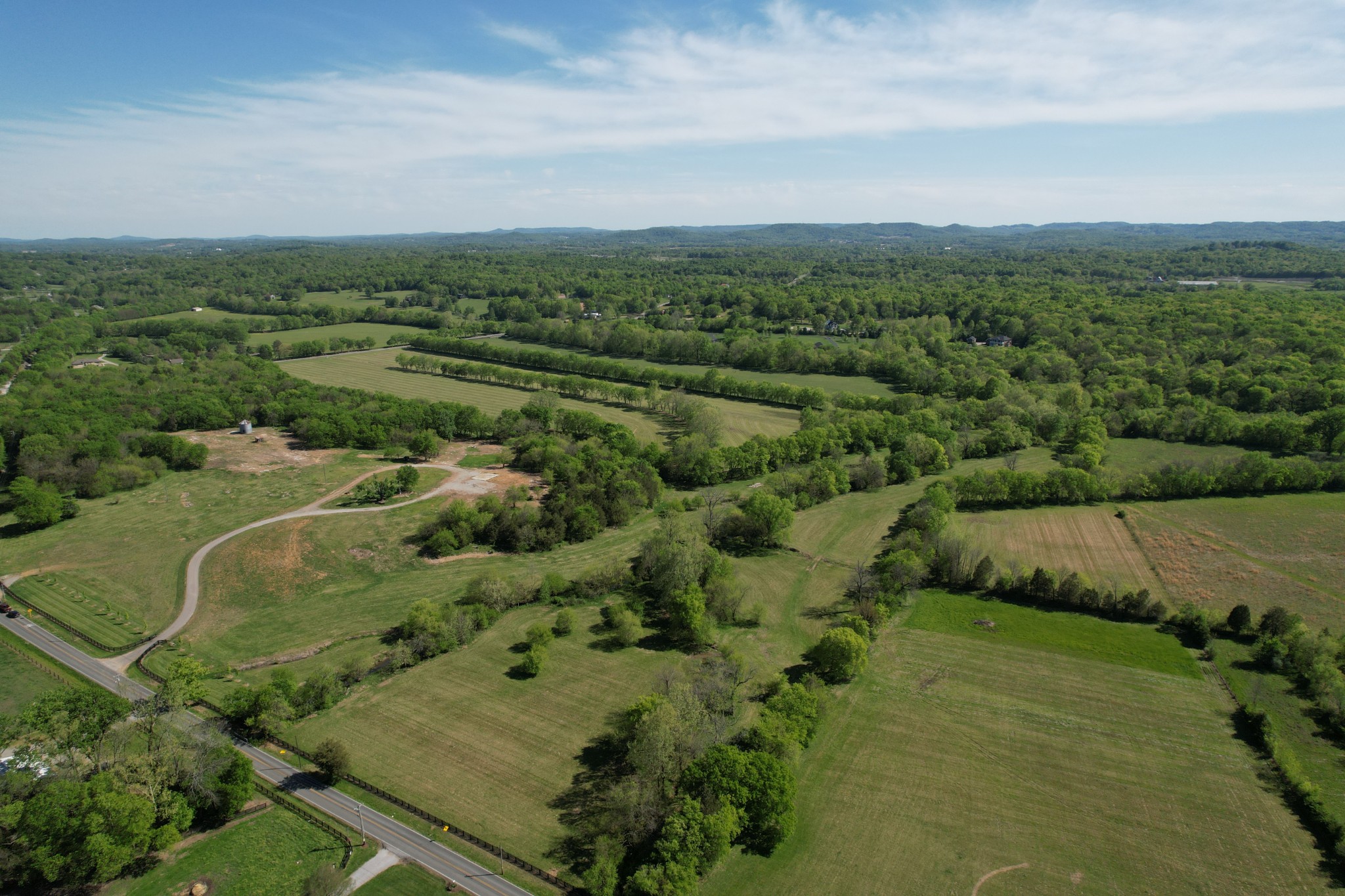 2 Wilson Pike Franklin, TN 37067 - Photo 6 of 13 an aerial view of residential houses with outdoor space and trees