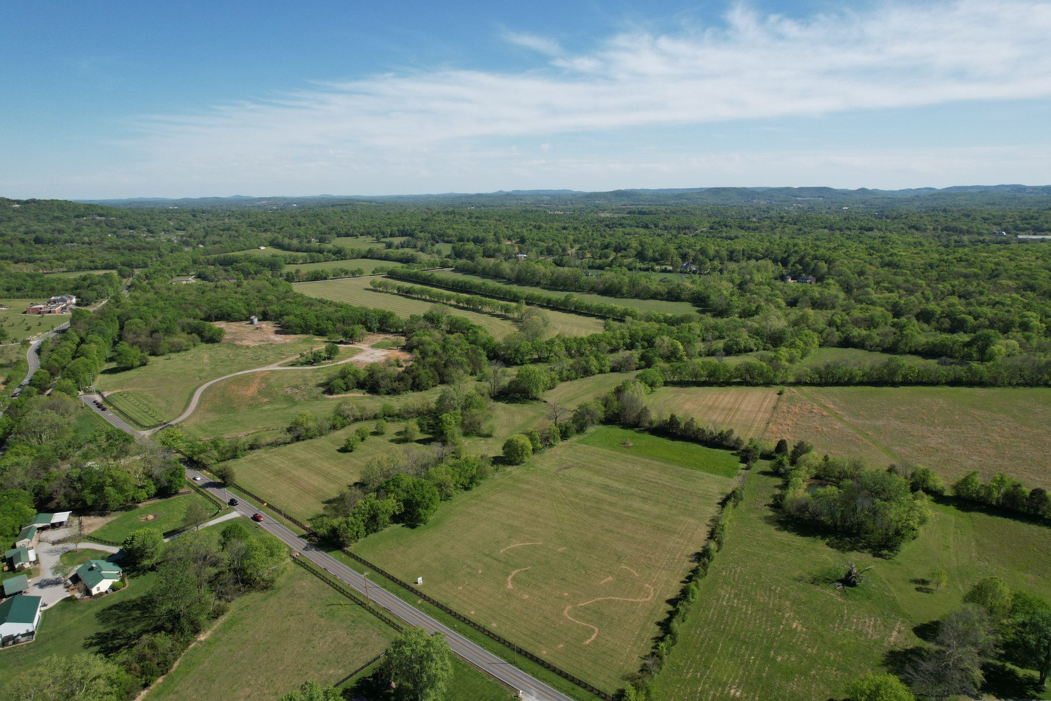2 Wilson Pike Franklin, TN 37067 - Photo 8 of 13 an aerial view of residential houses with outdoor space and trees