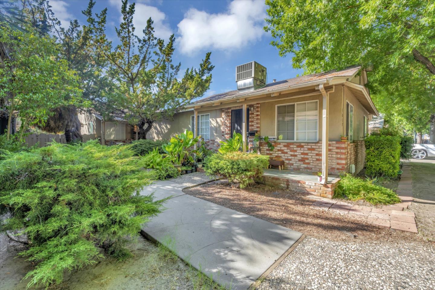 1019 Gemini Court Modesto, CA 95355 - Photo 1 of 10 a front view of a house with garden