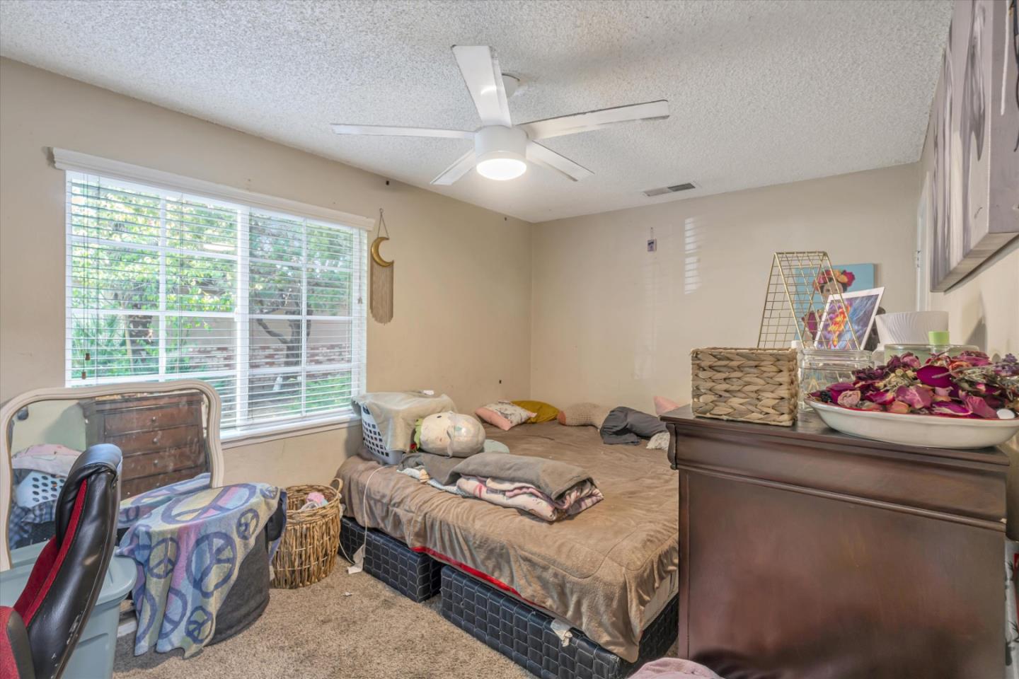 1019 Gemini Court Modesto, CA 95355 - Photo 5 of 10 a bedroom with bed and a window