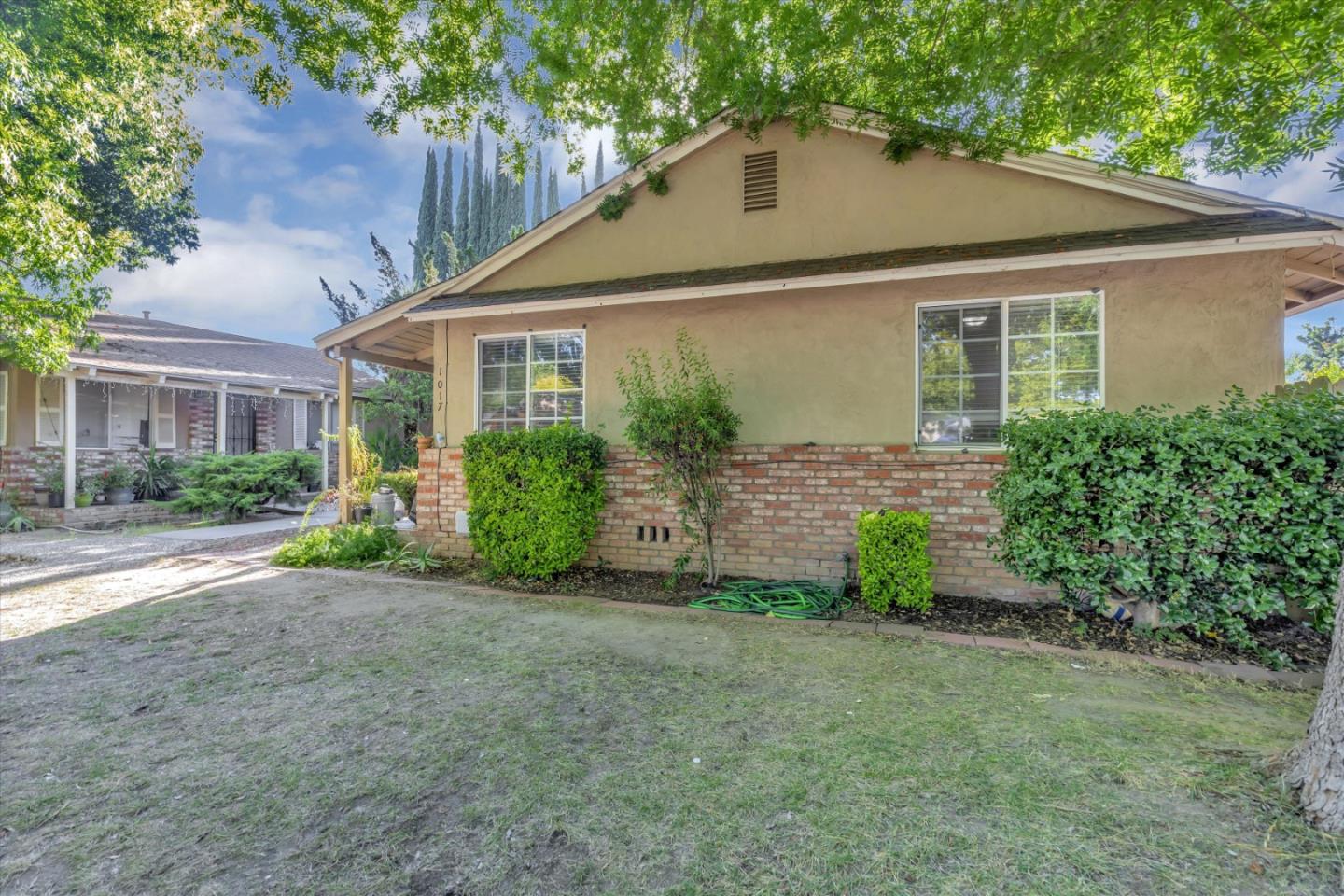 1019 Gemini Court Modesto, CA 95355 - Photo 10 of 10 front view of a house with a yard