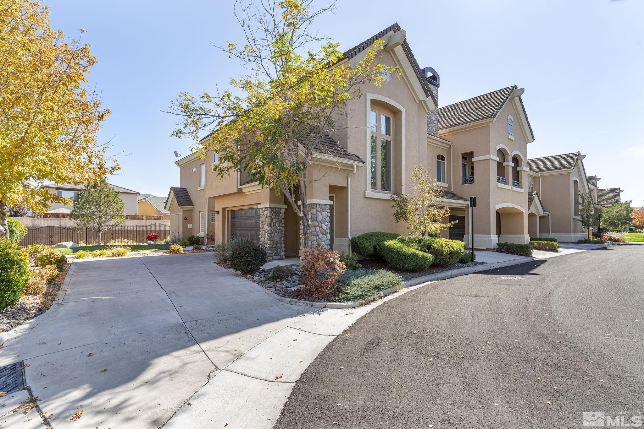 9900 Wilbur May Parkway, Unit 2404 Reno, NV 89521 - Photo 1 of 36 a view of a street with a building in the background