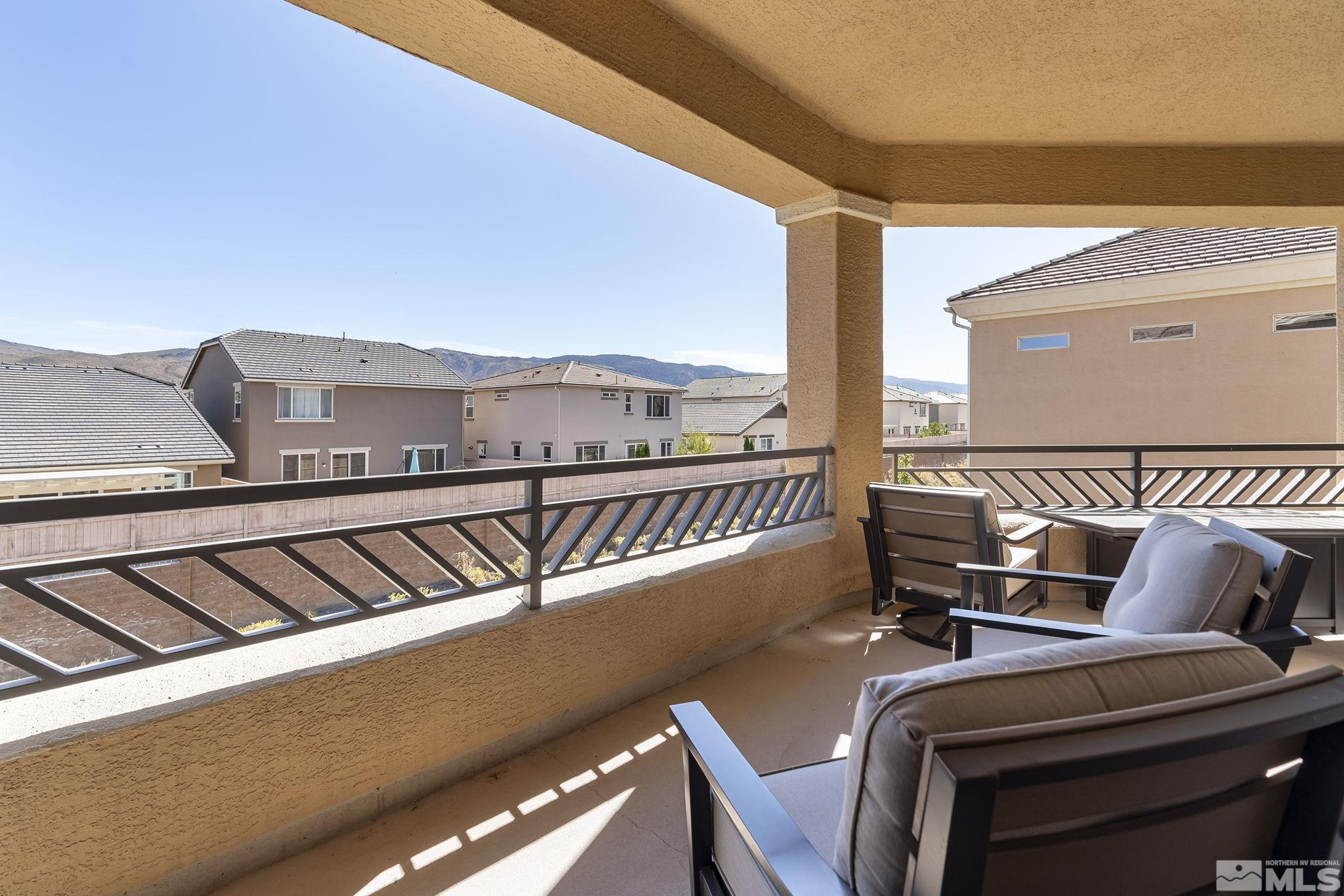 9900 Wilbur May Parkway, Unit 2404 Reno, NV 89521 - Photo 19 of 36 a view of a balcony with furniture