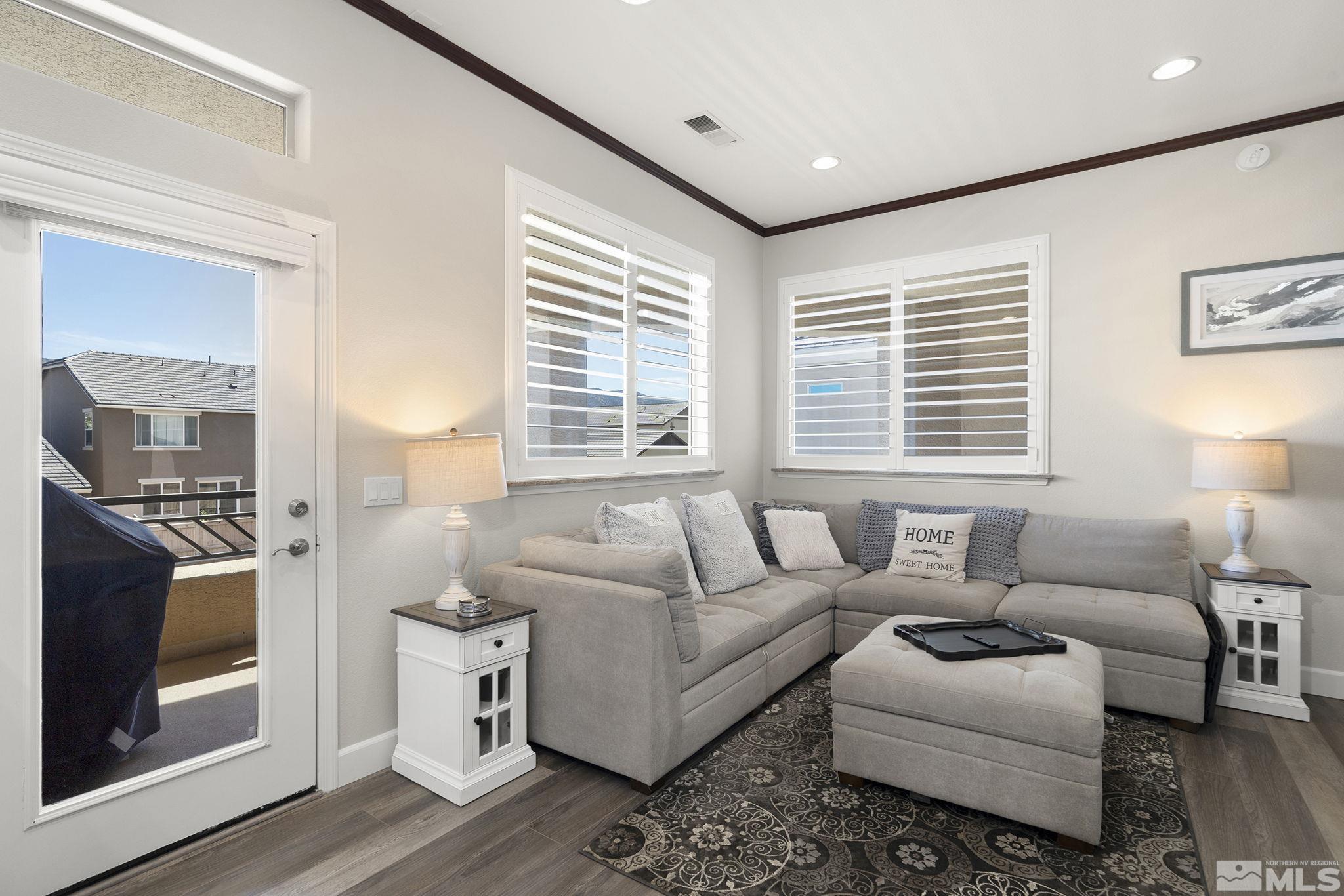 9900 Wilbur May Parkway, Unit 2404 Reno, NV 89521 - Photo 8 of 36 a living room with furniture and a window