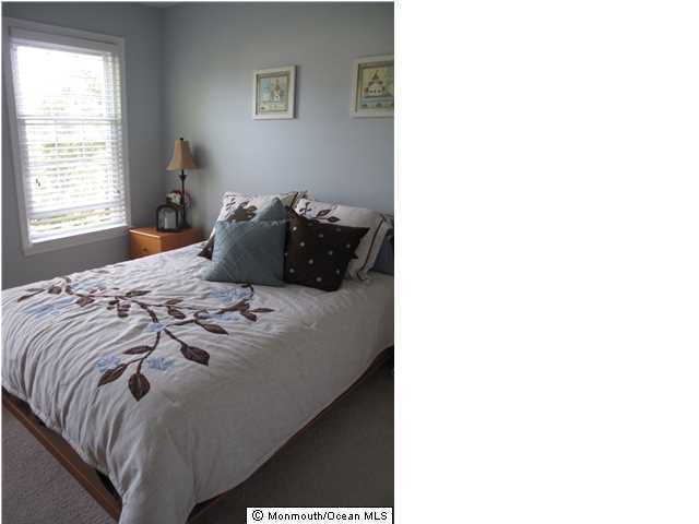 45 Sweet Gum Road Howell, NJ 07731 - Photo 19 of 25 a bedroom with a bed and a window